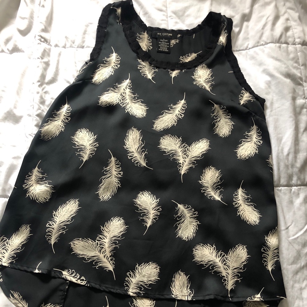 Lovely sleeveless blouse.